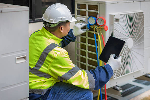 Professional Hvac Installation technician working in Lowell, AR
